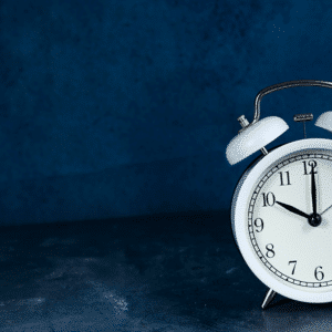 event image: alarm clock on dark blue background