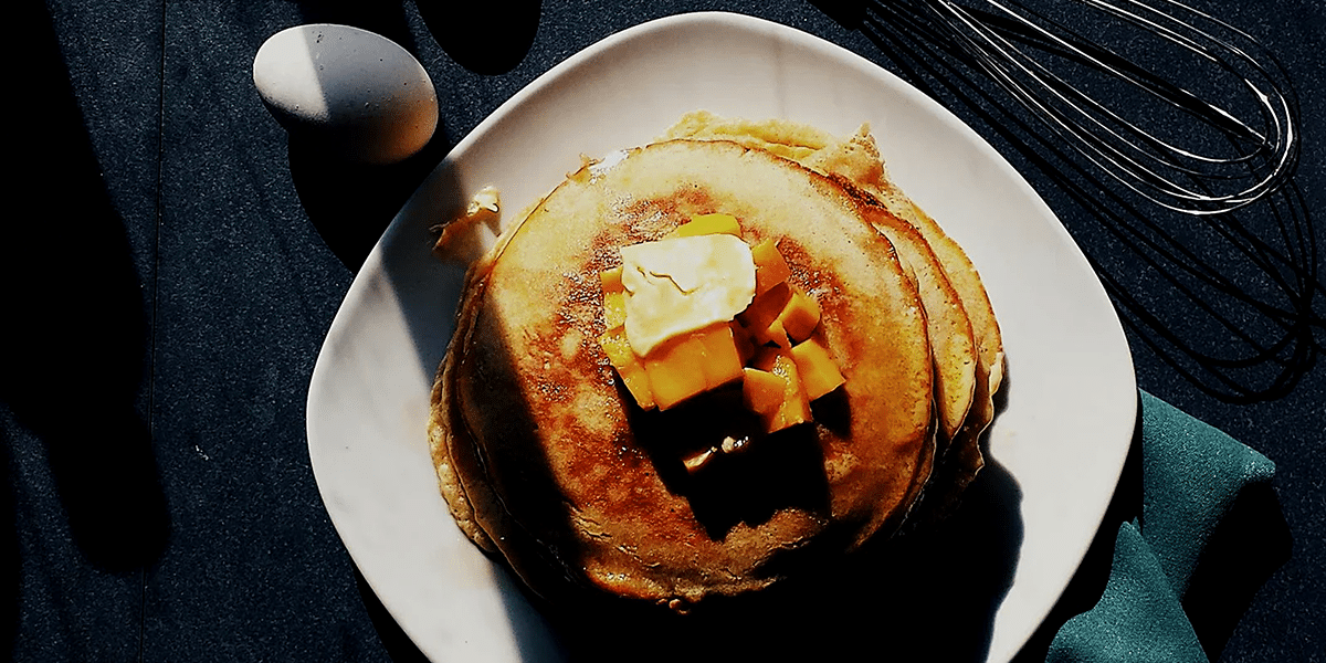 pancakes, egg and whisk